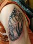 Screaming Needle Tattoo & Body Piercing